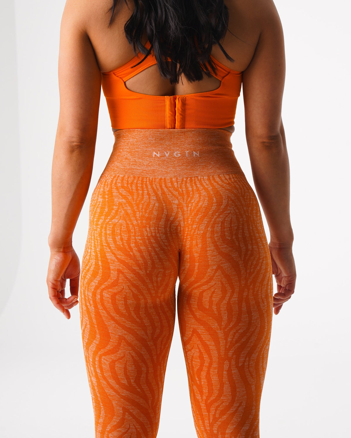 Women Burnt Orange Zebra Seamless Leggings - NVGTN