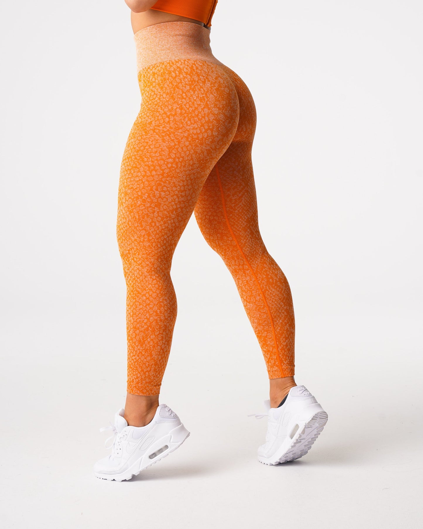 Women Burnt Orange Snakeskin Seamless Leggings - NVGTN