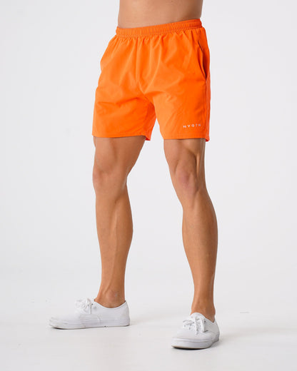 Men Orange Flex Shorts - NVGTN