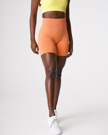 Women Sunset Orange Scrunch Seamless Shorts - NVGTN