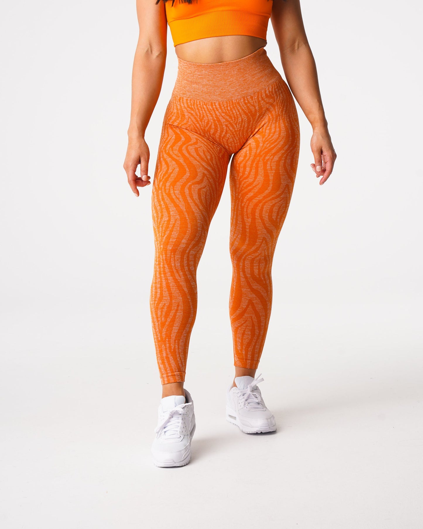 Women Burnt Orange Zebra Seamless Leggings - NVGTN