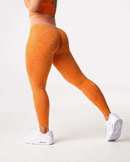 Women Burnt Orange Snakeskin Seamless Leggings - NVGTN