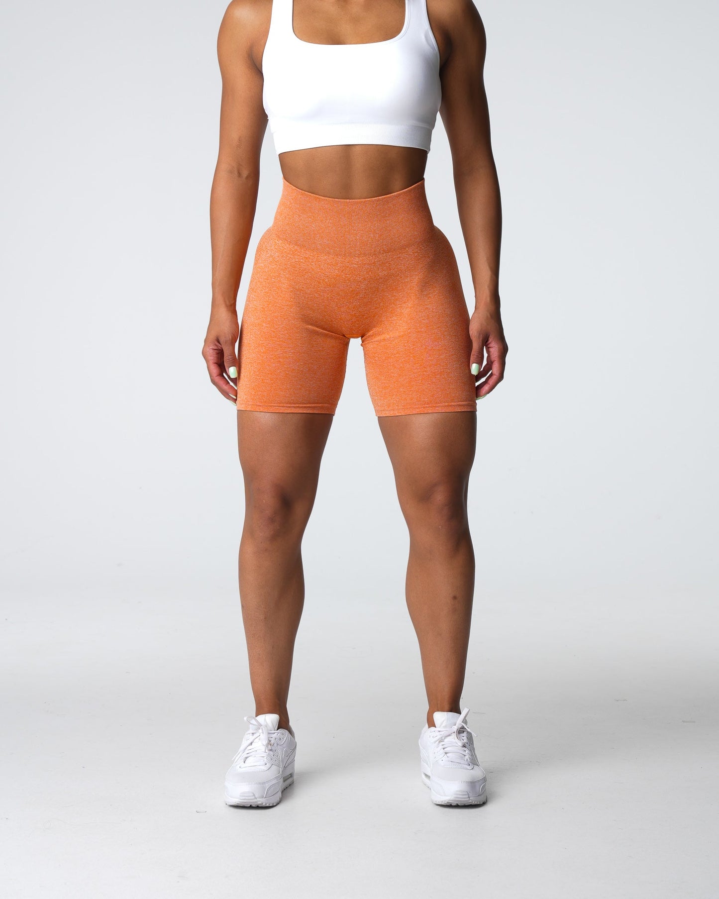 Women Burnt Orange Scrunch Seamless Shorts - NVGTN