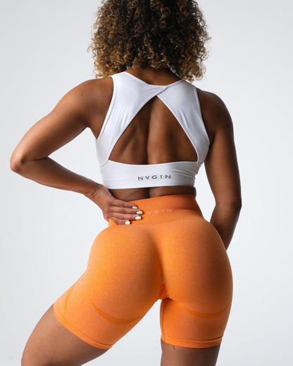 Women Sunset Orange Contour Seamless Shorts - NVGTN