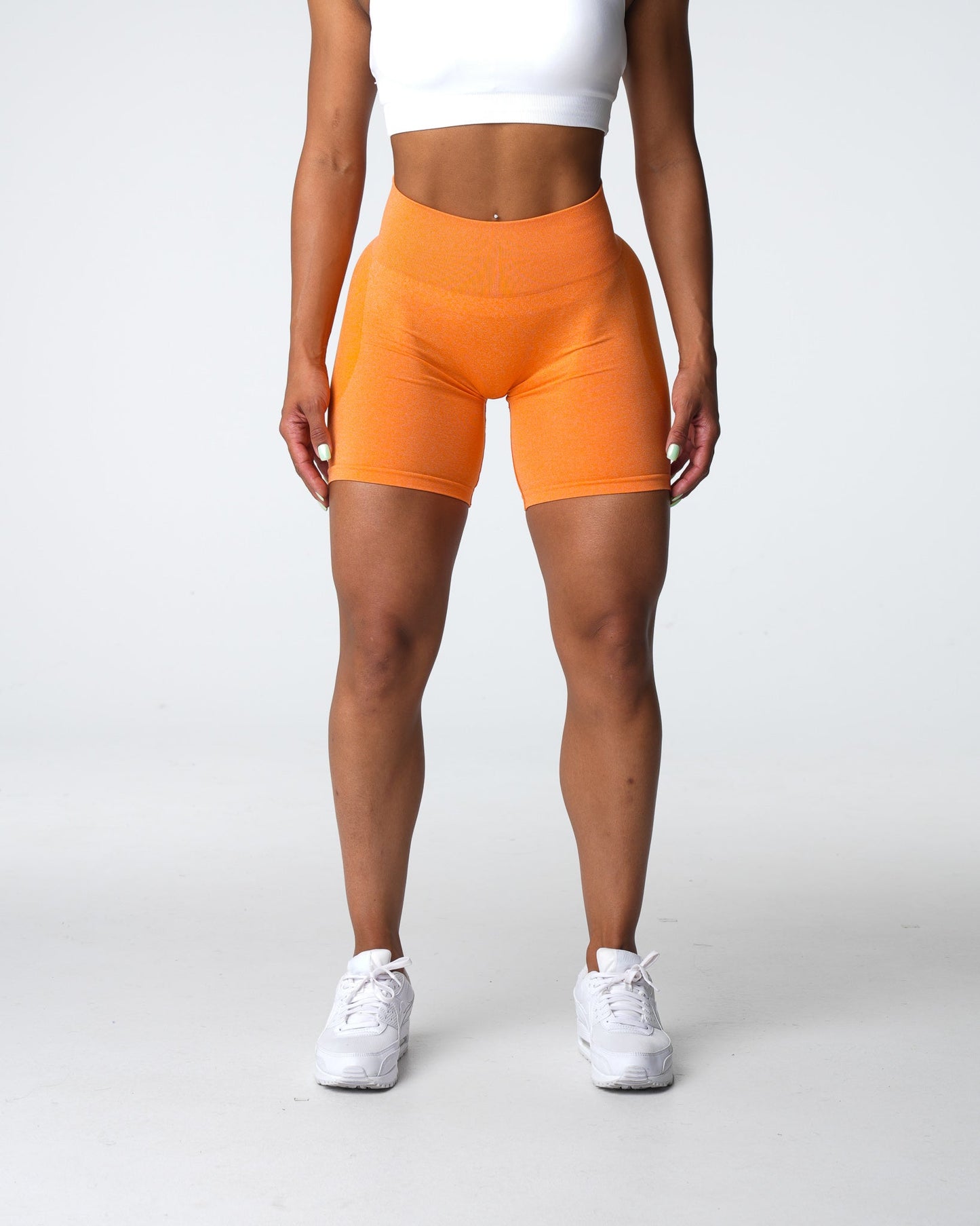 Women Sunset Orange Contour Seamless Shorts - NVGTN