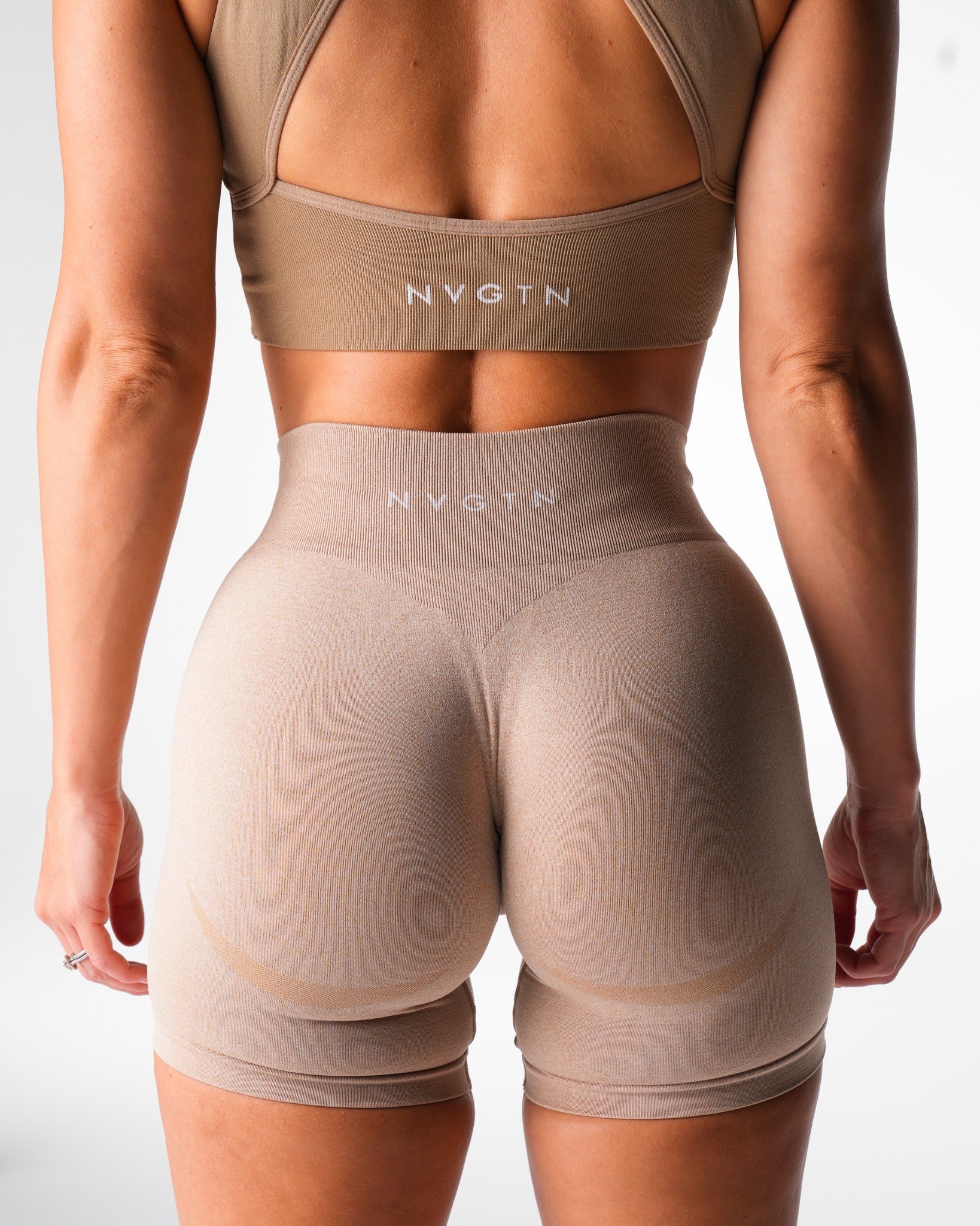 Women Beige Mid Rise Contour Seamless Shorts - NVGTN