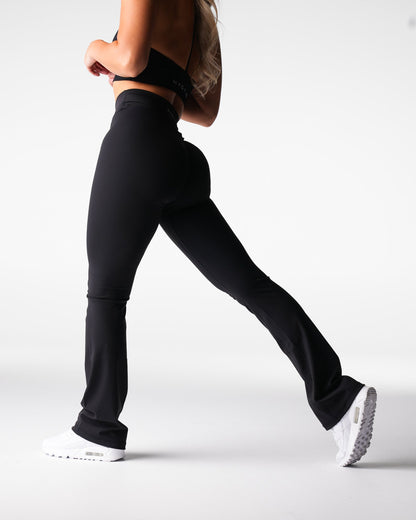 Women Black Effortless Flare Leggings - NVGTN