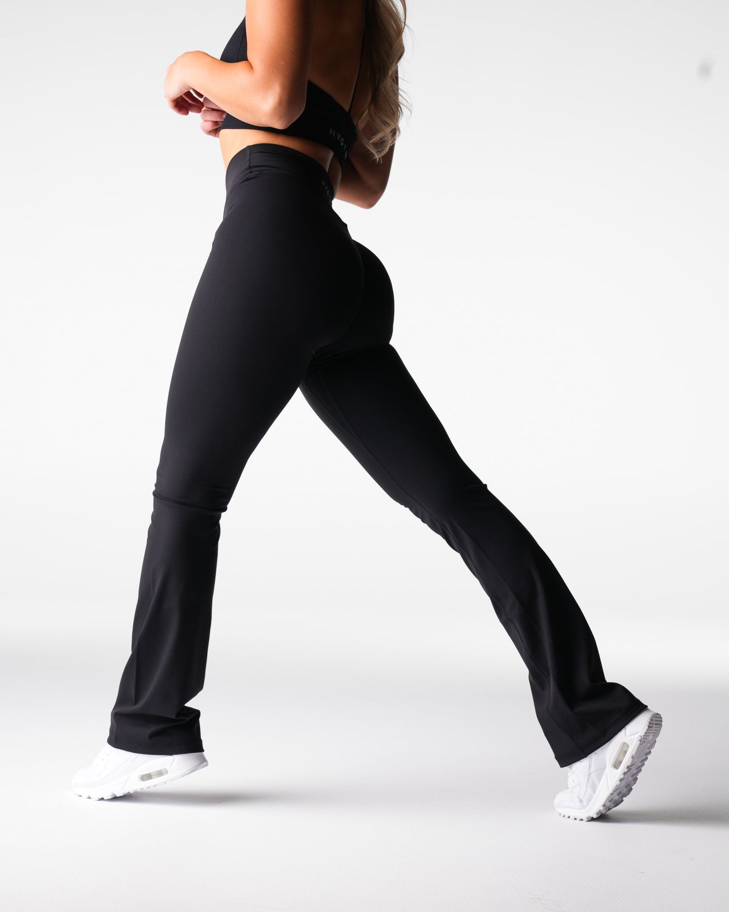 Women Black Effortless Flare Leggings - NVGTN